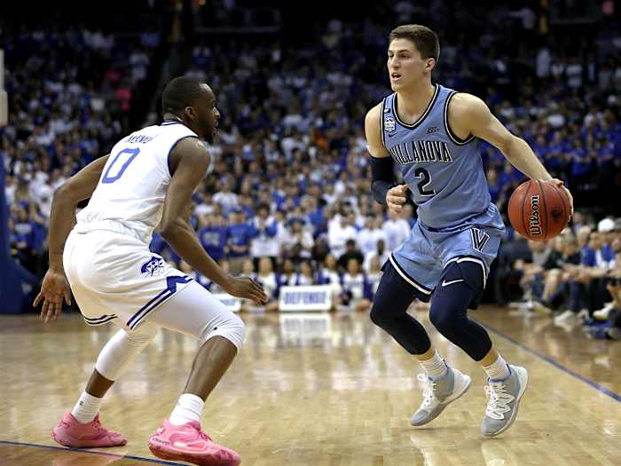 March 4, 2020; Newark, New Jersey, USA; Villanova Wildcats guard Collin Gillespie (2) dribbles against Seton Hall Pirates guard Quincy McKnight (0) during the first half at Prudential Center.